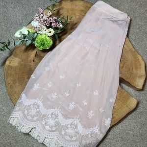 Soft pink lace trimmed skirt